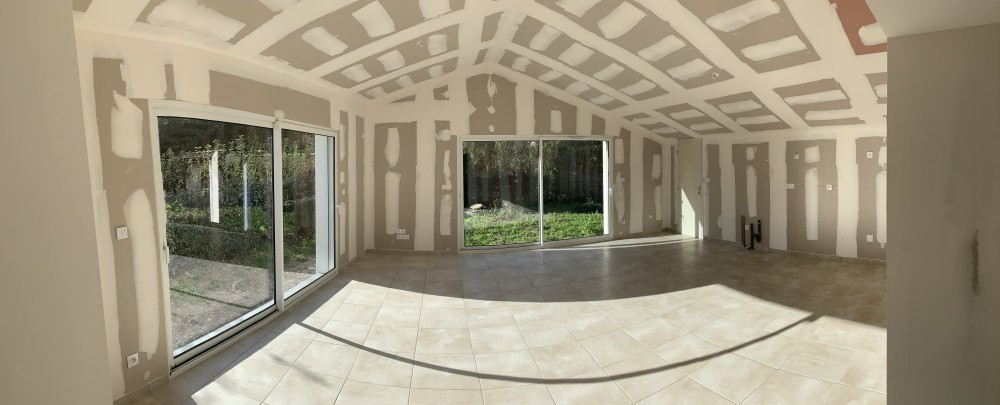 Extension de maison avec aménagement d’un garage en chambre