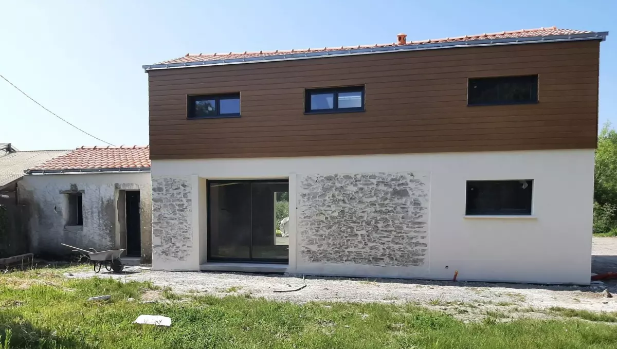 Extension de maison avec surélévation ossature bois